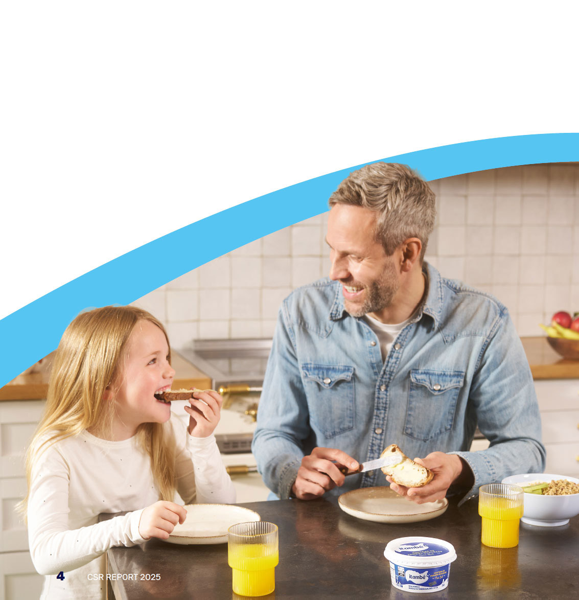 Photo of a father and his daughter eating dairy products