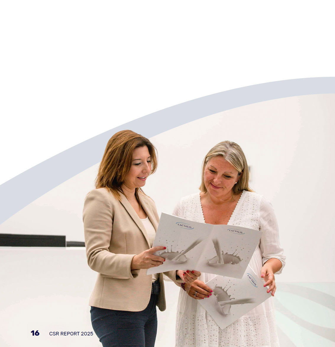 Photo of two women consulting a Lactalis report